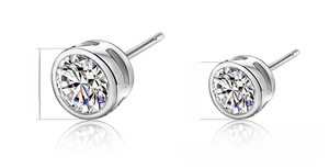 Size comparison showing 0.8cm and 0.5cm round cubic zirconia studs in 925 silver