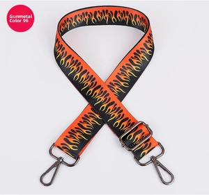 Adjustable crossbody bag strap with orange flame pattern and gunmetal hooks