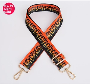 Detail of No. 96 strap with orange flame pattern and light gold metal rotating hooks
