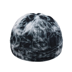 Winter tie-dye knit beanie in black and grey ribbed design with a retro cuffed brim