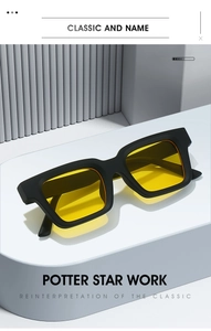 Detail of square vintage sunglasses with black matte frames and yellow transparent lenses
