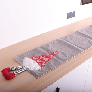 Christmas gnome burlap table runner with gray linen fabric and long striped legs decoration