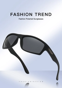 Detail view of black polarized sunglasses with fashion frame and silver metal temple inlay