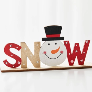 Festive wooden SNOW letter sign with snowman and Santa patterns for Christmas table decor
