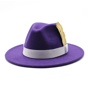 Purple wool fedora hat with a white ribbed ribbon and a stylish golden feather ornament