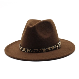 Close-up of brown wool felt fedora hat featuring a leopard print band and metal buckle
