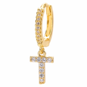 Detail of 18k gold plated huggie earring with micro-paved zircon letter T pendant