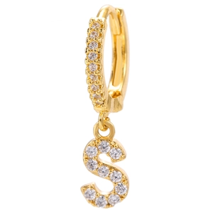 Detailed view of 18k gold plated huggie earring with zircon encrusted S-letter pendant