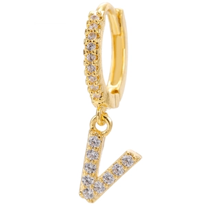 Macro detail of V-letter pendant earring with micro-paved zircons and 18k gold plating