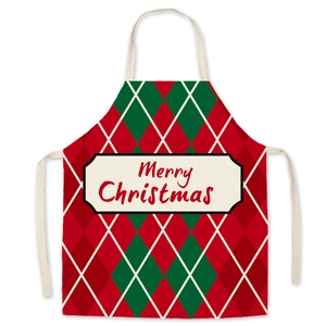 Red and green argyle Christmas apron with Merry Christmas text for festive kitchen use
