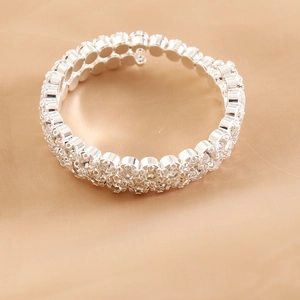 Detail showing double row sparkling rhinestones on a silver elastic bridal bracelet