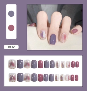 Detail of R132 press-on nails set with grey-blue and rose marble gold foil design