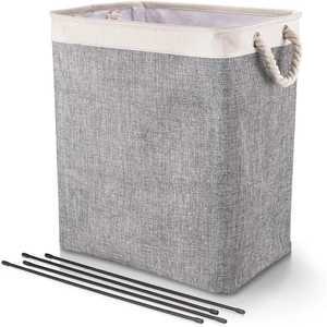 Detail of gray foldable laundry basket with rope handles and four black support rods