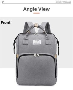 Front view of grey multi-functional diaper backpack with durable fabric and storage pockets