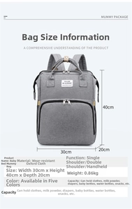 Detail view of the gray multi-functional diaper bag with size dimensions and dual straps