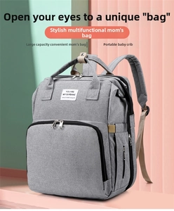 Macro shot of grey multi-functional baby bag showing durable fabric and thick straps
