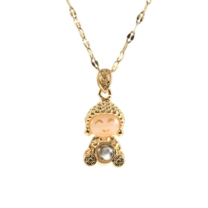 Golden buddha pendant necklace with pink and iridescent stones on a gold chain