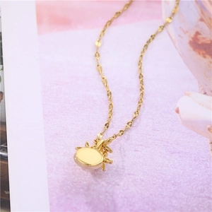 Pink opal flower necklace in gold titanium steel with a detailed sun pattern backing