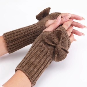 Brown knitted fingerless gloves for women with cute bow detail and ribbed warm cuffs