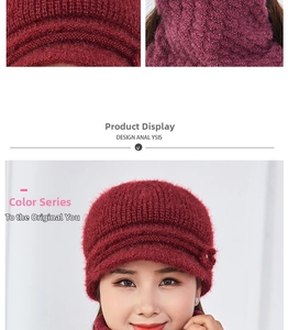 Detail of burgundy winter knit hat and scarf set showing fuzzy texture and flower motif