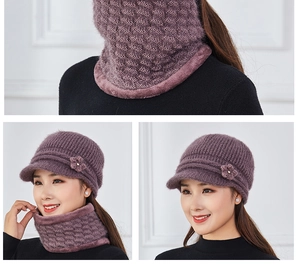 Close-up of purple knit texture and fleece lining on winter hat and scarf set for women