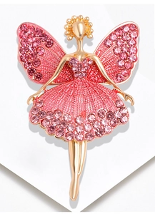Close-up of ballet dancer brooch featuring pink crystals and golden metal finish