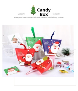 Close-up of three-color Christmas gift boxes with festive ribbons and Santa prints