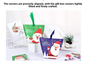 Detail of Christmas candy boxes with Santa patterns and satin ribbon handles