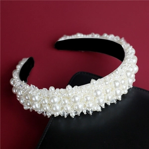 Elegant bridal headband with white pearls and crystals on black base for women