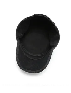 Detail of wool flat cap for men showing thick fleece lining and foldable ear flaps