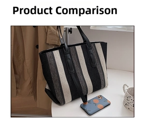 Gros plan du sac cabas en toile rayée tricolore avec poignée en cuir noir dans un décor réel