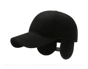 Close-up of winter wool baseball cap showing black knit texture and metal side buckle