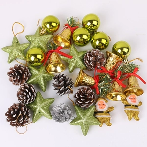 Detailed view of Christmas tree ornaments set including stars, bells, and pine cones