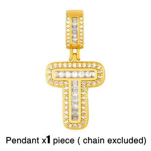Detail of gold letter T pendant with white zircon stones on a clean white background
