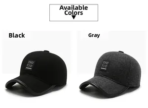 Close-up of wool texture and leather logo detail on black and gray baseball caps