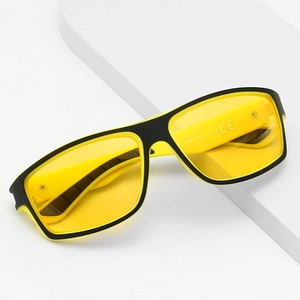 Polarized sports sunglasses with black and yellow frames and yellow night vision lenses