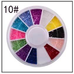 Kit décoration ongle avec 12 perles colorées dans un boîtier carrousel rond pratique