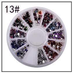 Vue de dessus d'un carrousel à 12 compartiments avec paillettes étoiles pour nail art