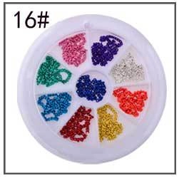 Vue de dessus d'un carrousel à 12 compartiments de strass multicolores pour nail art