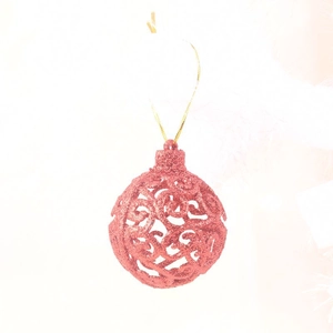 Detail of pink hollow Christmas ball with glitter texture and gold hanging string