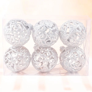 Set of 6 silver hollowed Christmas tree ornaments with glitter patterns in a clear box