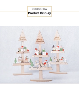 Detail of wooden Christmas tree decor featuring reindeer, snowman and Merry Christmas engraving