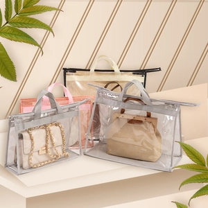 Transparent PVC dustproof handbag storage bags with fabric edges and handles for closet