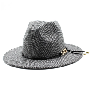Classic houndstooth wool fedora hat with black leather band and gold chain detail