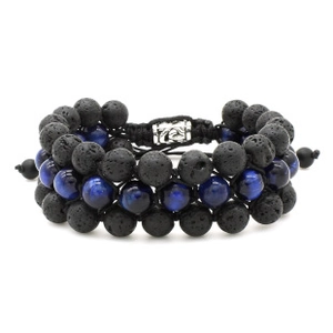 Detail view of woven beaded bracelet featuring black lava stones and blue tiger eye beads