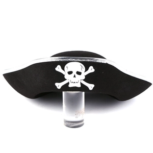 Detail of black felt pirate hat with skull and crossbones print on white background