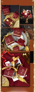 Close-up of burgundy velvet wedding candy gift box with gold ribbon and sweet love text