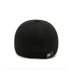 Rear view of black winter baseball cap featuring adjustable silver metal buckle detail