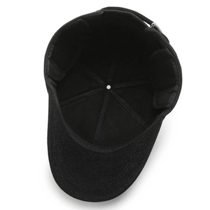 Inner structure of a warm black baseball cap with plush lining and adjustable metal buckle