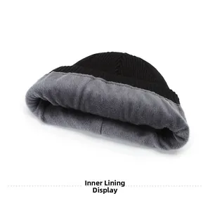 Detailed interior view of the black winter knit beanie with thick grey fleece lining